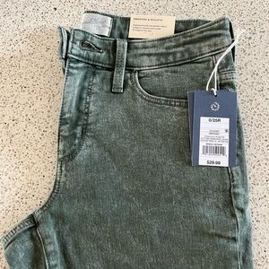 Dark faded green jeans
